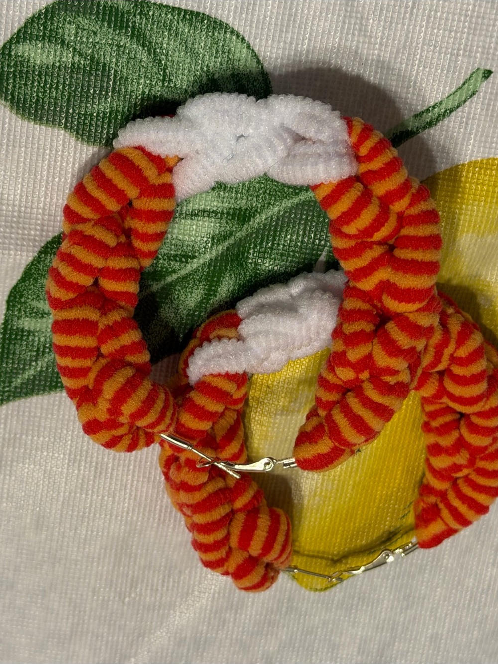 Plush Red and Orange Striped Hoop Earrings with White Knot Accent